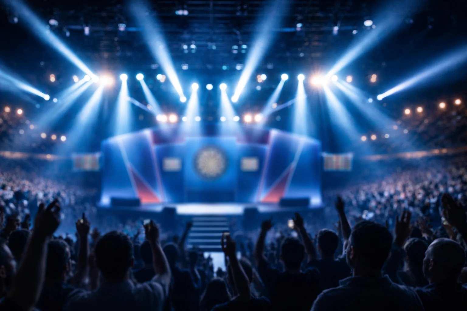 Dartscheibe auf einer großen Turnierbühne mit Scheinwerfern und Publikum — Symbolbild für den PDC-Turnierkalender
